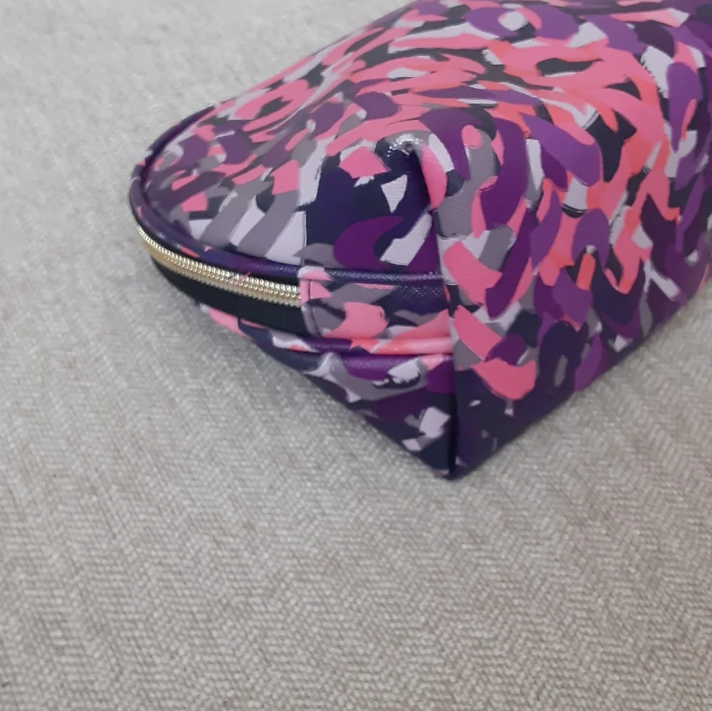 Trina Turk multi color print leather makeup bag